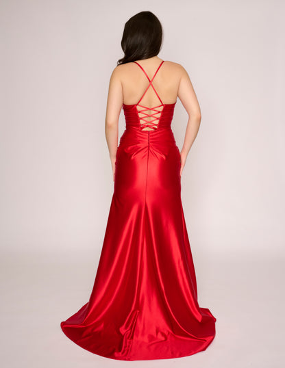 This Nina Canacci size 2 prom dress features a long, fitted silhouette crafted from luxurious satin that elegantly contours the body. The gown showcases a flattering V-neckline and a corset design for structured support and a refined shape. A daring slit adds a touch of allure, making it an ideal choice for formal events and evening occasions where sophistication meets style.

Size: 2

Color: Red