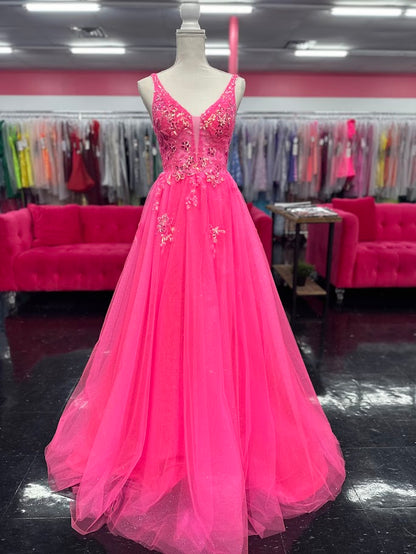 This Nina Canacci 4427 ballgown in size 4 showcases exquisite sequin lace detailing over a sheer bodice, creating a refined and elegant look. The flattering V-neckline and classic A-line silhouette enhance your figure while offering graceful movement. Perfect for prom or formal events, this gown combines timeless sophistication with subtle sparkle for a memorable evening.

Size: 4

Color: Fuchsia