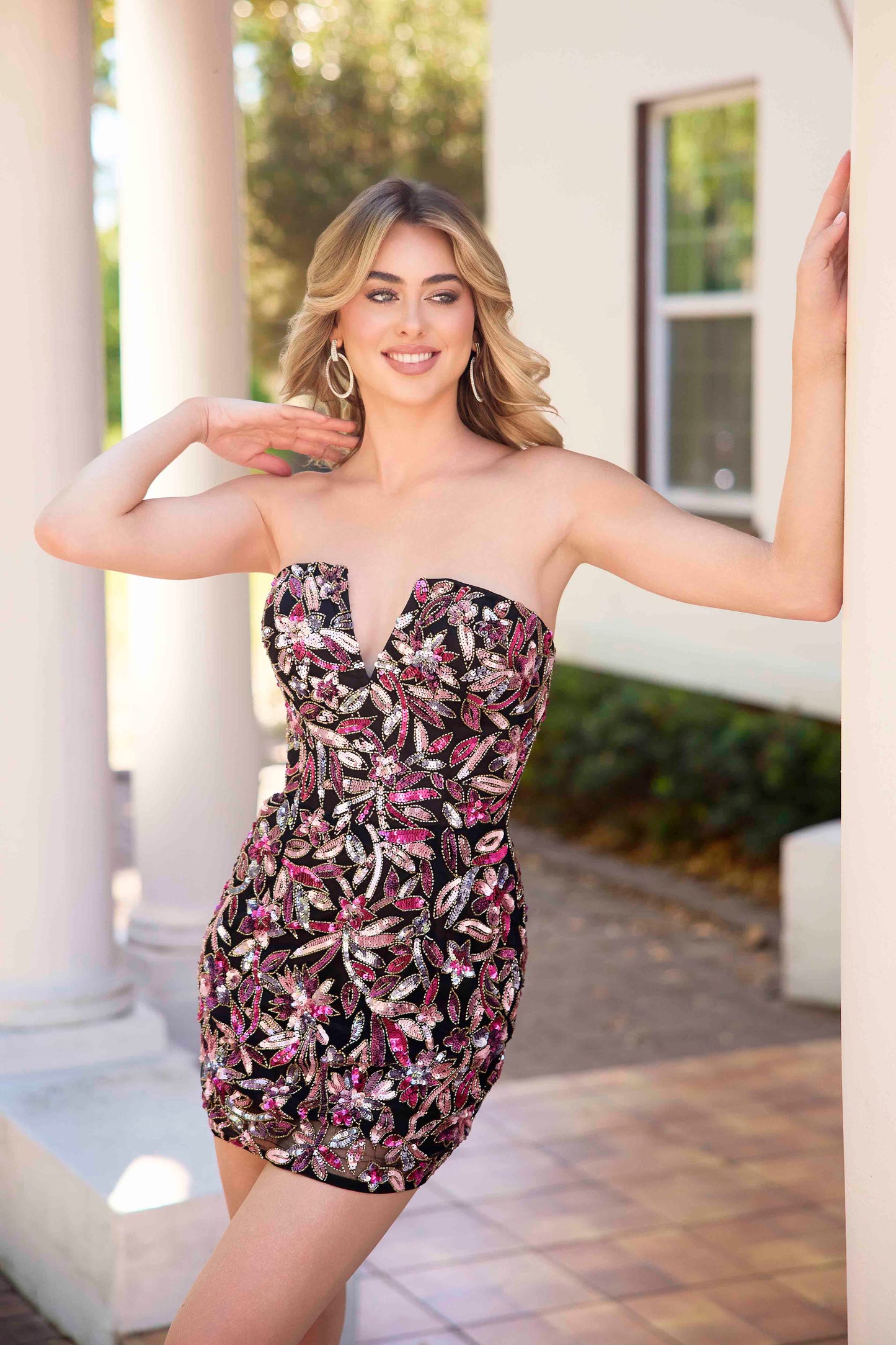 The Primavera Couture 4431 is a short homecoming dress featuring intricate beaded sequins arranged in a delicate floral pattern. Designed with a flattering V-neckline, this cocktail gown combines elegance with youthful charm. Its detailed embellishments catch the light beautifully, making it ideal for special occasions where standout sophistication is desired. The shorter length allows for easy movement while maintaining a polished and refined appearance.

Sizes: 000-16

Colors: Black, Ivory