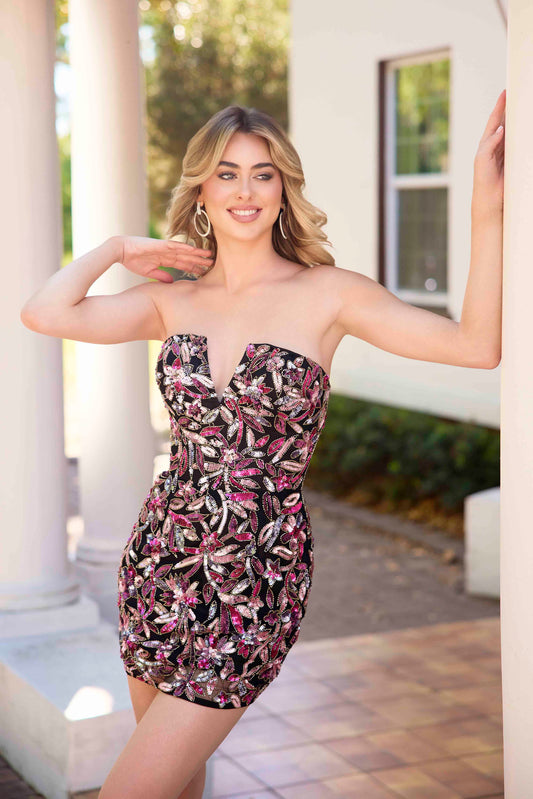 The Primavera Couture 4431 is a short homecoming dress featuring intricate beaded sequins arranged in a delicate floral pattern. Designed with a flattering V-neckline, this cocktail gown combines elegance with youthful charm. Its detailed embellishments catch the light beautifully, making it ideal for special occasions where standout sophistication is desired. The shorter length allows for easy movement while maintaining a polished and refined appearance.

Sizes: 000-16

Colors: Black, Ivory