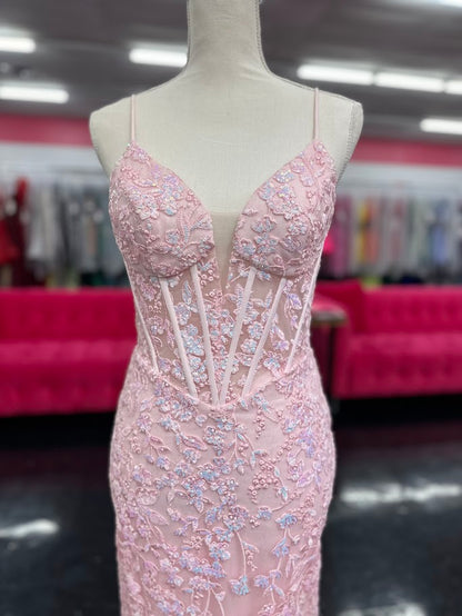 Elevate your formal occasion with the Nina Canacci 4434 gown, designed in a delicate peach hue. This size 4 mermaid dress features a sheer lace corset bodice adorned with subtle sequins, creating an elegant shimmer. The flattering V-neckline enhances your silhouette, while the fitted mermaid skirt offers a graceful, sophisticated finish perfect for prom or any special event.

Size: 4

Color: Peach