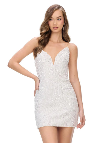 White beaded dress worn by a model on a white background