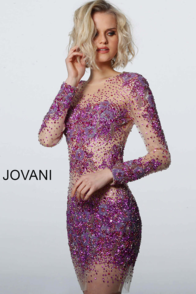 Jovani's 47598 Sheer Beaded Dress is perfect for any special event. Featuring a sheer beaded design, long sleeves, and a short fit, this dress exudes elegance and sophistication. Expertly crafted from high-quality materials, this design will ensure you look and feel your best.