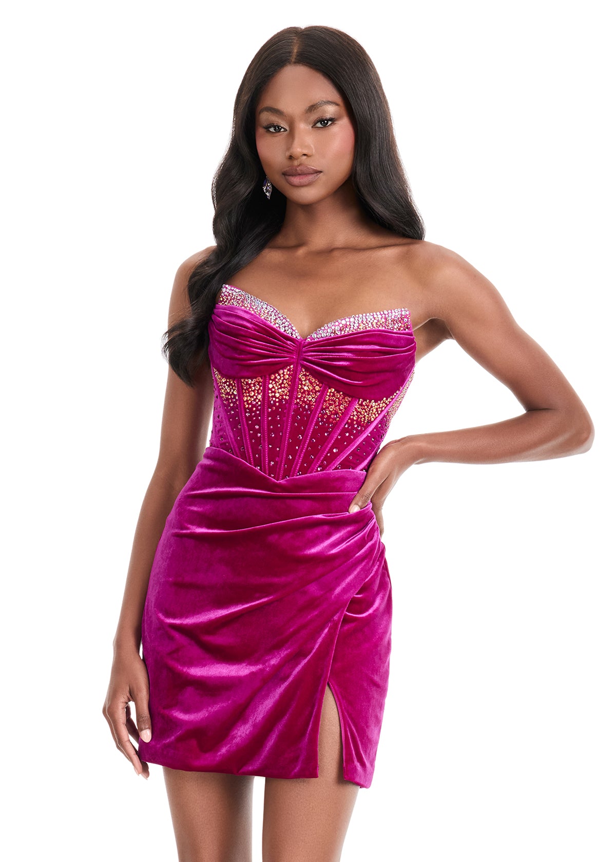 Elevate your evening with the Ashley Lauren 4865, a short fitted velvet corset dress designed to captivate. Featuring a pointed V-neck and a crystal-embellished slit, this cocktail gown combines elegance with a touch of allure. Its luxurious velvet fabric and structured corset silhouette ensure a flattering fit, perfect for homecoming or any special occasion where sophistication is key.&nbsp; Make a striking entrance in ASHLEYlauren Style 4865, a velvet mini dress featuring a beaded corset bodice with a swe
