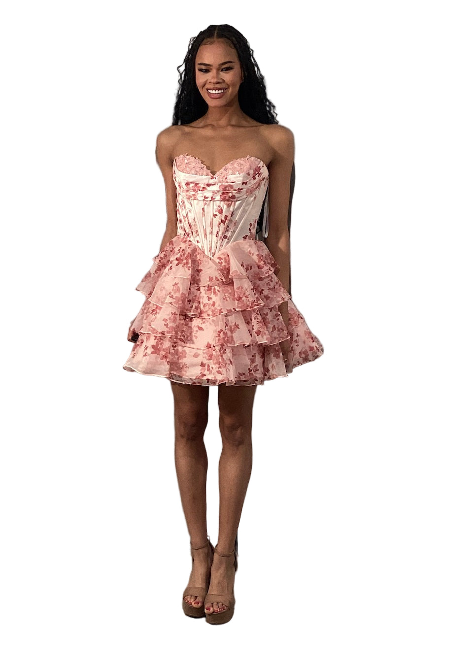 This Jovani 48771 homecoming dress features a flattering fit-and-flare silhouette with a corset bodice for structured support. The short, A-line skirt is enhanced with delicate ruffles and a vibrant floral print, creating a youthful yet elegant look. Crafted with lace accents, this cocktail dress balances sophistication and playful charm, making it an ideal choice for memorable celebrations and formal events.

Sizes: 00-24

Colors: Blue Print, Blush Print, Green Print