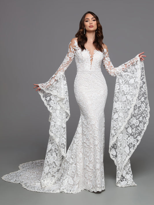 The Davinci Bridal 50735 Long Bell Sleeve Lace Wedding Dress Sheer Mermaid Bridal Gown is a timeless, sophisticated choice for your special day. Embellished with intricate lace details and featuring an illusion neckline for security, this floor-length gown will create a beautiful silhouette with its vintage-inspired bell sleeves and shaped train. 