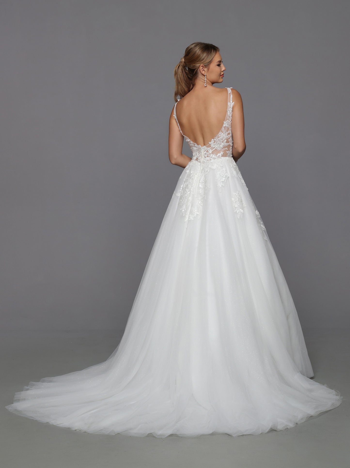 DaVinci Bridal 50769 A-Line Ballgown Illusion High Neck Long Sleeve Floral Lace Train Wedding Gown. Convertible dresses are always on-trend, like this lush ball gown with sheer full-length sleeves highlighted with rich lace applique. The alluring low scoop back is balanced by the modest bateau neckline.