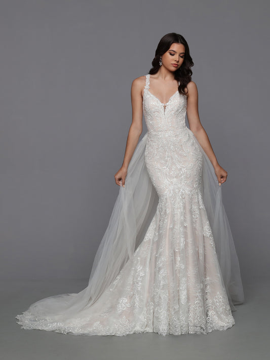 DaVinci Bridal 50783 Mermaid Fit And Flare Lace V-Neck Detachable Train Wedding Gown. What could be better than a delicious lace mermaid wedding dress? A mermaid dress with a removable ball gown bridal skirt! The sheer lace racerback bodice and lace-edged train make this look practically perfect.