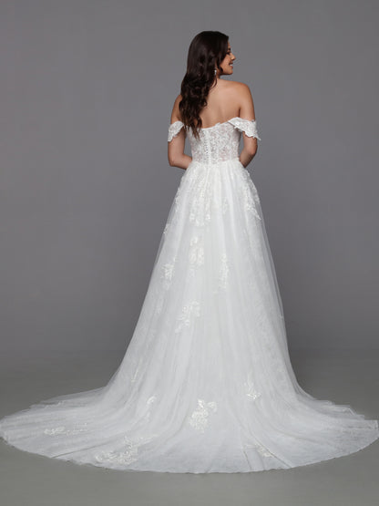 Look effortlessly feminine on your big day with Davinci Bridal 50787 Long Lace A Line wedding dress. Crafted with an off-the-shoulder bodice and sheer skirt adorned with delicate lace applique, the fitted bodice features a beaded front and back that adds a touch of glamour. Perfect for a romantic, yet modern look!  Sizes: 2-20  Colors: Ivory