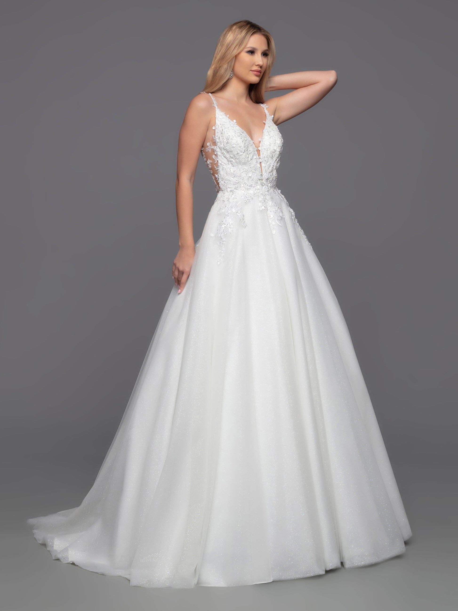 Davinci Bridal 50801 Long Shimmer Tulle Ballgown Sheer lace wedding dress Open Back is a timeless choice with a modern twist. This ball gown features a classic layered tulle skirt and a contemporary bodice with sheer sides, a low keyhole and covered button detail. The perfect combination of style and sophistication for any special occasion.  Sizes: 2-20  Colors: Ivory