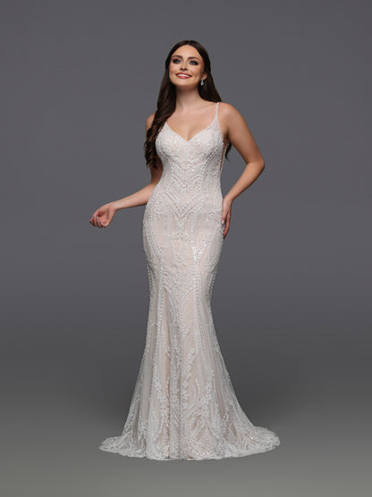 Elevate your bridal elegance with the Davinci Bridal 50926 gown in size 12. This ivory and nude wedding dress features intricate beading and a sheer overlay that adds delicate sophistication. The flowing train and button details along the back create a timeless silhouette, perfect for a graceful entrance on your special day.

Fabric:&nbsp;Beaded Tulle

Neckline:&nbsp;Straps, V-Neck

Silhouette:&nbsp;Fit &amp; Flare

Details:&nbsp;Back Interest, Beading, Buttons, Chapel Train, Open Back, Sheer Back, Sheer Bo