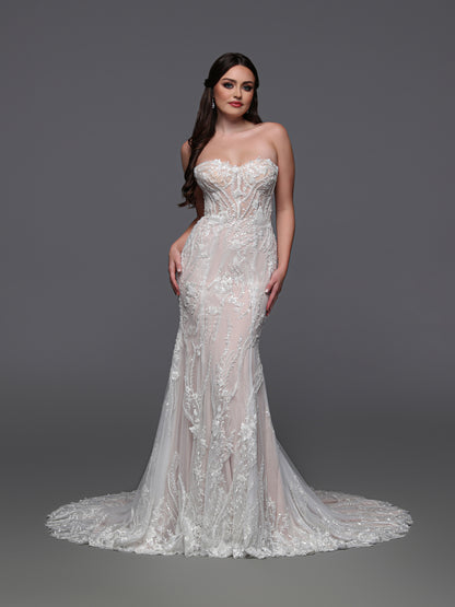 This exquisite Davinci Bridal gown in size 8 features delicate ivory lace adorned with intricate beading, creating a timeless and elegant look. The sheer corset bodice offers a flattering silhouette, while the mermaid skirt gracefully enhances your figure. Perfect for the bride seeking a sophisticated blend of classic charm and modern allure on her special day.

Fabric:&nbsp;Lace, Tulle

Neckline:&nbsp;Strapless, Sweetheart

Silhouette:&nbsp;Fit &amp; Flare

Details:&nbsp;3D Flowers, Back Interest, Beading,