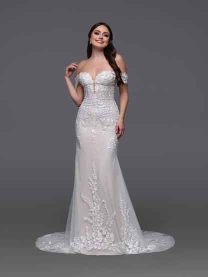 Elevate your bridal elegance with the Davinci Bridal 50943 gown. This size 2 dress features a delicate ivory and nude lace overlay, perfectly fitted to accentuate your silhouette. The off-the-shoulder design adds a timeless, sophisticated touch, making it an exquisite choice for your special day.&nbsp;

Fabric:&nbsp;Lace, Tulle

Neckline:&nbsp;Off The Shoulder, Sweetheart

Silhouette:&nbsp;Fit &amp; Flare

Details:&nbsp;Chapel Train, Cold Shoulder, Lace, Lace Applique, Open Back, Sheer Bodice, Sheer Skirt, 