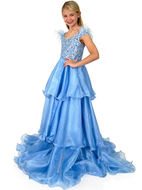 This exquisite Marc Defang 5143 Girls Pageant Dress features a feather off the shoulder straps, fully beaded bodice with shimmering layer organza skirt. The perfect dress for a special occasion, this dress will make your little girl feel like a princess.  Sizes: 4-14  Colors: Lilac, Baby Blue