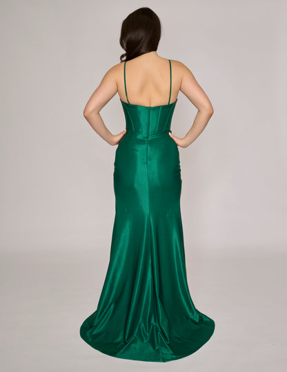 The Nina Canacci 5303 gown is a long, fitted satin dress designed for formal occasions. It features a crystal-embellished wrap detail, a daring slit, and a plunging neckline, combining elegance with a modern edge. This dress offers a flattering silhouette that enhances your figure while providing a sophisticated look perfect for prom or special events. Crafted with attention to detail, it ensures both style and comfort throughout your evening.

Size: 0

Color: Emerald