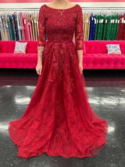 This Nina Canacci 5311 gown in size 4 features a rich lace fabric crafted into a flattering A-line silhouette. The high neckline and formal sleeves offer a polished, elegant look, while delicate beading and sequins add a subtle shimmer perfect for evening events. Ideal for mother-of-the-bride or other formal occasions, this dress combines timeless sophistication with exquisite detailing.

Size: 4

Color: Burgundy