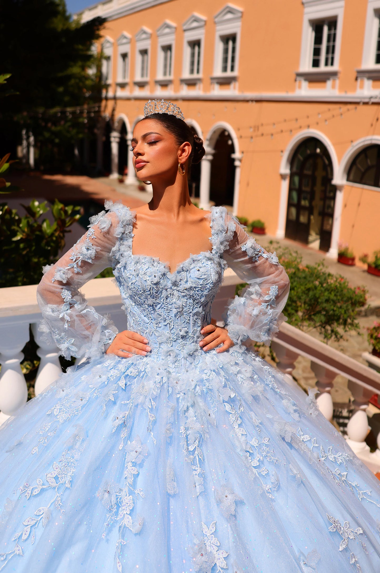 Expertly crafted with shimmering crystal embellishments, the Amarra 54290 Quinceanera Dress exudes elegance and sophistication. Its long lace sleeves and corset ball gown silhouette provide a flattering fit for any special occasion. Stand out in this stunning dress and make a statement with its intricate details.