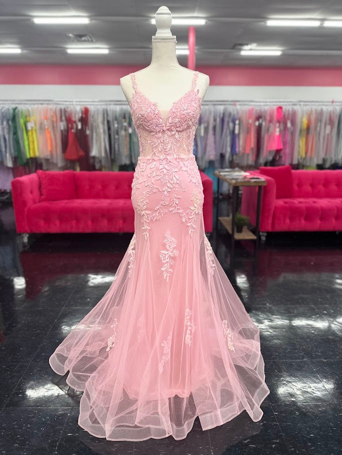 This Nina Canacci 6627 gown in size 4 combines elegance and sparkle with its sheer corset-style bodice featuring delicate lace straps and a lace-up back. The glitter tulle mermaid skirt adds a shimmering finish, creating a sophisticated silhouette perfect for prom or formal occasions. Its refined design ensures you stand out with timeless grace and modern charm.

Size: 4

Color: Pink