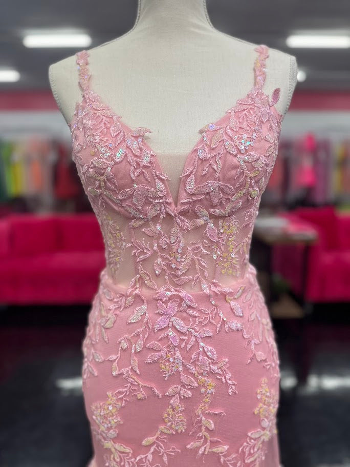 This Nina Canacci 6627 gown in size 4 combines elegance and sparkle with its sheer corset-style bodice featuring delicate lace straps and a lace-up back. The glitter tulle mermaid skirt adds a shimmering finish, creating a sophisticated silhouette perfect for prom or formal occasions. Its refined design ensures you stand out with timeless grace and modern charm.

Size: 4

Color: Pink