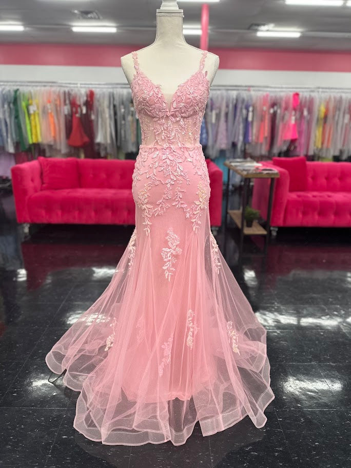 This Nina Canacci 6627 gown in size 4 combines elegance and sparkle with its sheer corset-style bodice featuring delicate lace straps and a lace-up back. The glitter tulle mermaid skirt adds a shimmering finish, creating a sophisticated silhouette perfect for prom or formal occasions. Its refined design ensures you stand out with timeless grace and modern charm.

Size: 4

Color: Pink