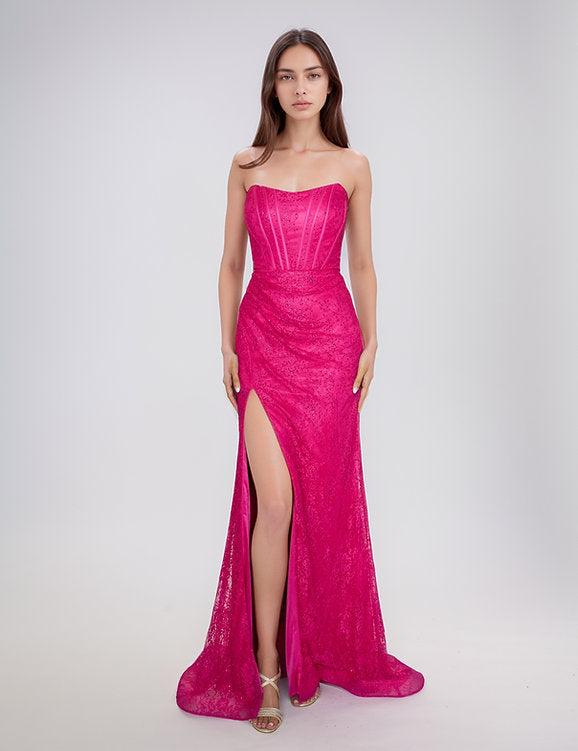 Elevate your formal occasion with the Nina Canacci 6646 prom dress, featuring a delicate long lace corset design in a striking magenta hue. This gown showcases a flattering scoop neckline and a tasteful slit, combining elegance with a hint of allure. it offers a refined silhouette perfect for making a memorable entrance.

Size: 0,&nbsp; 4

Color: Fuchsia