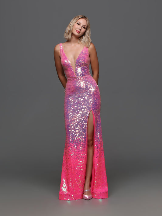 Introducing the Candice Wang 72301 Long Pink Sequin Ombre Prom Dress, the perfect combination of elegance and glamour. This stunning gown features a V-neckline and a subtle slit, making it a classic yet bold choice for any formal occasion. With its ombre sequin design, you'll shine and stand out from the crowd. Make a statement and feel confident in this eye-catching dress.  Sizes: 0-20  Colors: Bubblegum