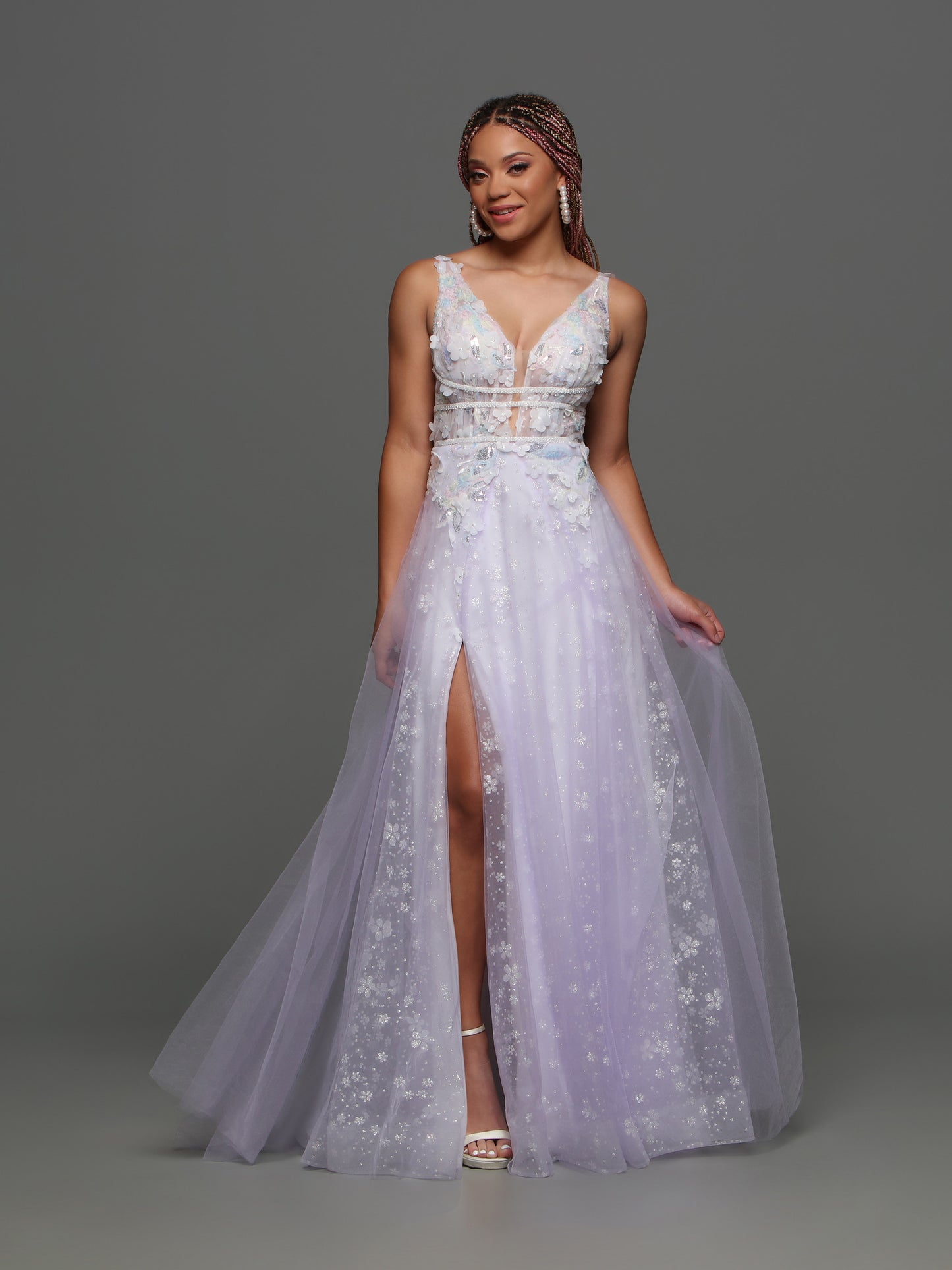 Get ready to turn heads in the Candice Wang 72308 Sheer Shimmer A Line Maxi Slit Prom Dress. The floral pastel design and sheer fabric create a breathtaking effect, while the A-line silhouette and high leg slit offer a flattering fit. Perfect for any formal occasion, this gown will make you feel confident and elegant.