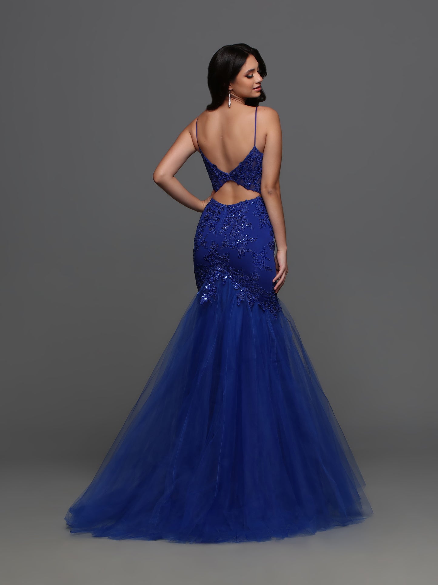 Expertly crafted by renowned designer Candice Wang, the 72321 Fitted Lace Mermaid Prom Dress is a stunning evening gown that showcases a sheer corset V neck and a cut out back. Perfect for prom or any formal event, this dress exudes elegance and sophistication.  Sizes: 0-20  Colors: Black, Red, Cobalt