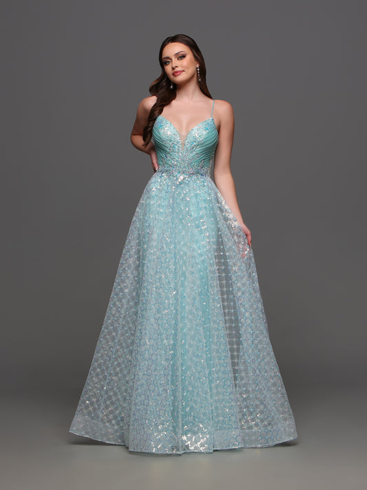 Upgrade your formal look with the Candice Wang 72332 Long Sequin A Line Prom Dress. The shimmer of sequins paired with the elegant V neck lace detail creates a showstopping look. The A line silhouette flatters all body types. Perfect for prom or any formal event.  Sizes: 4-20  Colors: Mint