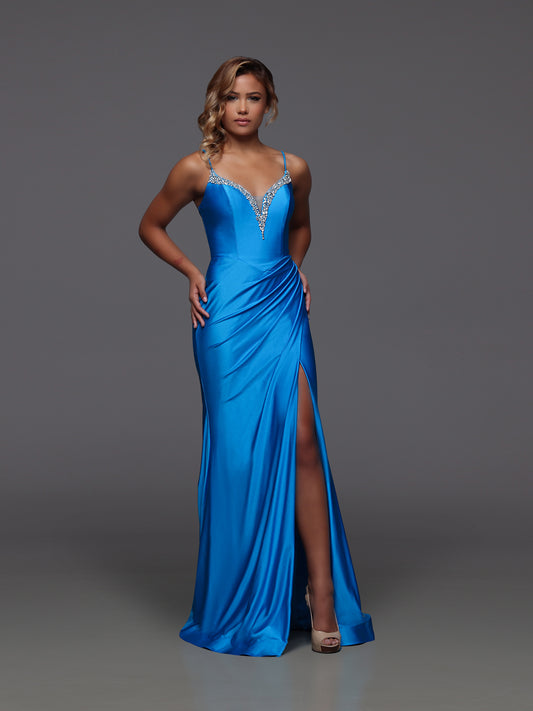 Turn heads in the Candice Wang 72442 prom dress, crafted to hug your silhouette in a striking peacock hue. This long, fitted gown features a dazzling crystal-embellished V-neck and a flattering corset design that sculpts your figure. The ruched fabric adds texture while the high slit offers a bold, confident edge—perfect for making a memorable entrance at your next event.

Size: 10

Colors: Peacock
