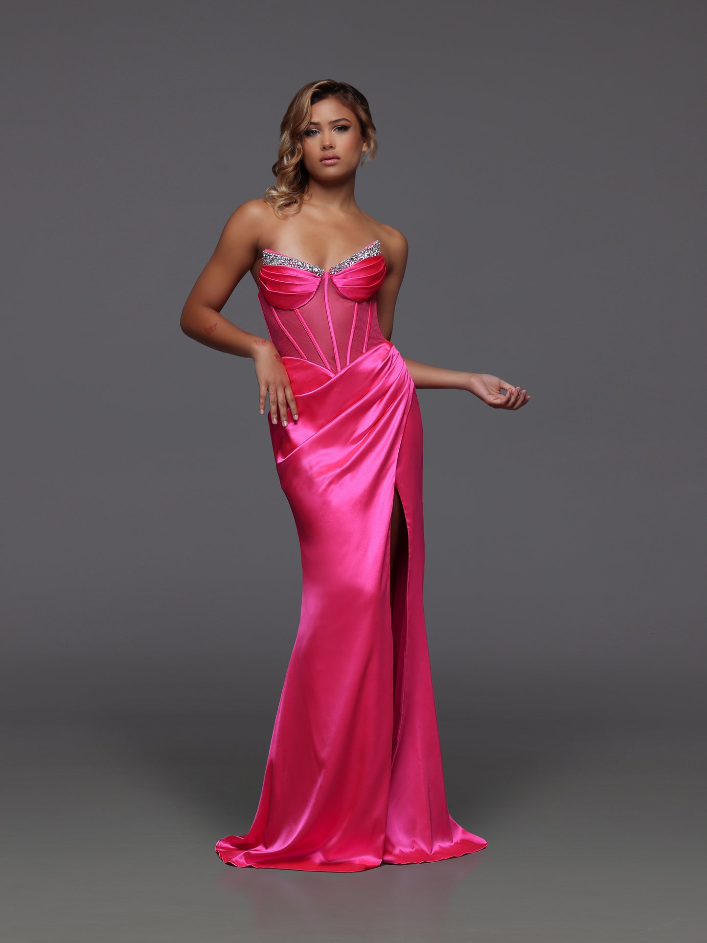 Step into the spotlight with this neon pink sheer corset prom dress by Candice Wang. Featuring a crystal-studded V neckline and a ruched back, this size 6 design is crafted to highlight your bold style. The sheer fabric and structured corset create a daring silhouette that demands attention at any event.

Size: 6

Color: Neon Pink