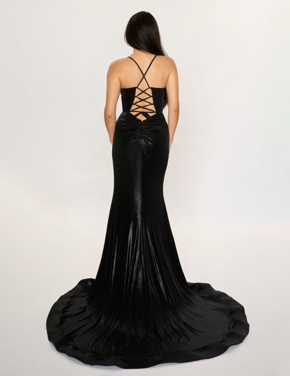 The Nina Canacci 7604 prom dress in size 2 features a striking burgundy metallic fabric that catches the light beautifully. This fitted gown highlights your silhouette with a structured corset bodice and a sophisticated cowl neck. A daring slit and elegant train add movement and drama, making it an ideal choice for formal events where you want to make a confident, refined statement.

Size: 4

Color: Black