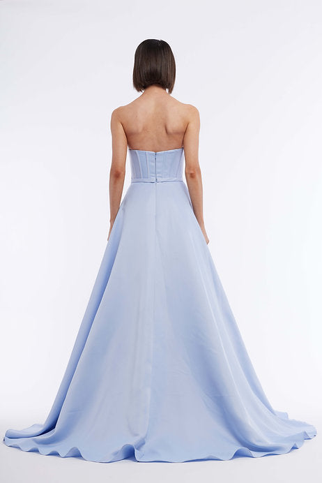 Expertly designed and crafted for prom, pageants, or any formal occasion, the Vienna Prom 7878 Long Dress boasts a strapless corset bodice, elegant maxi slit train, and alluring open back. Be the center of attention and make a statement with this stunning gown.