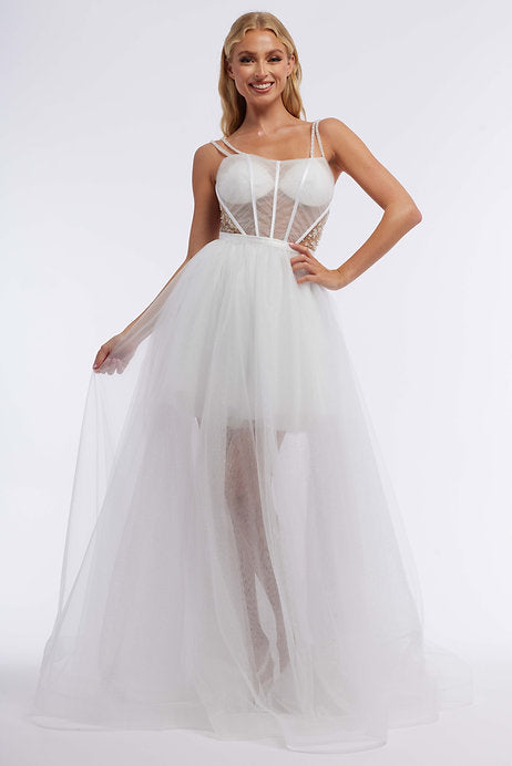 Experience the elegance and glamour of Vienna with our 7879 Long Short Prom Dress. This stunning dress features a corset top and a detachable sheer skirt, adorned with delicate beadwork on sides and straps. The tulle fabric adds a touch of femininity and the perfect amount of flow to this formal pageant gown. Elevate your style and confidence with this timeless Vienna creation.