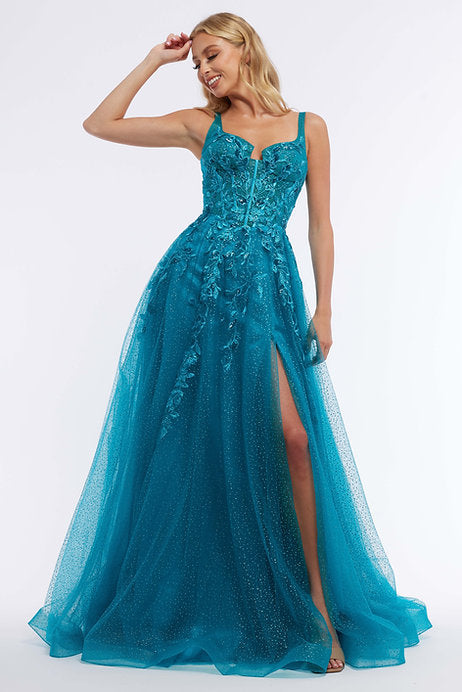 Elevate your formal attire with the Vienna Prom 7886 Long Prom Dress. This stunning sleeveless gown features intricate 3D floral detailing and a trendy slit on the tulle skirt. Perfect for pageants or prom, it adds elegance and modern flair to any occasion.