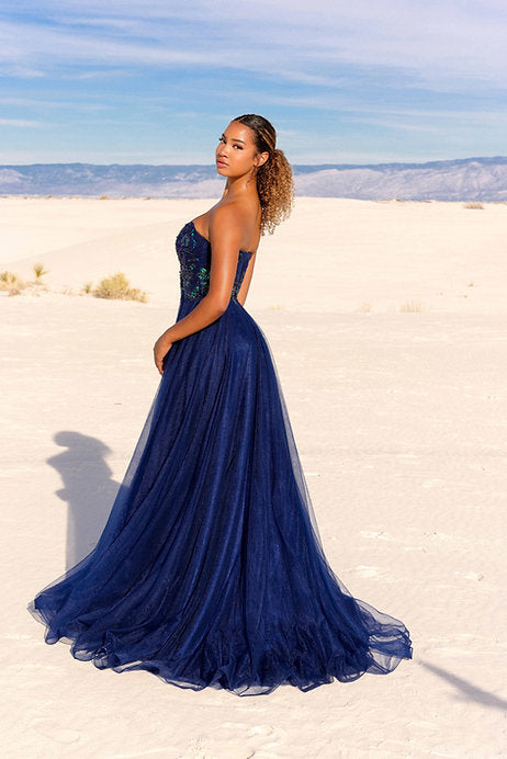Introducing the Vienna Prom 7887 Long Prom Dress - the ultimate choice for your special occasion. This elegant gown features a flattering A-line silhouette and a plunging neckline for a sophisticated look. Made with high-quality materials, this dress is perfect for any formal event or pageant.