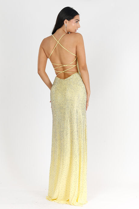 Elevate your style with Vienna Prom 7939 Long Prom Dress. This elegantly fitted gown features intricate beaded detailing and a high slit, adding a touch of glamour to your formal look. The scoop neck and pageant-worthy design make it a perfect choice for any special occasion.