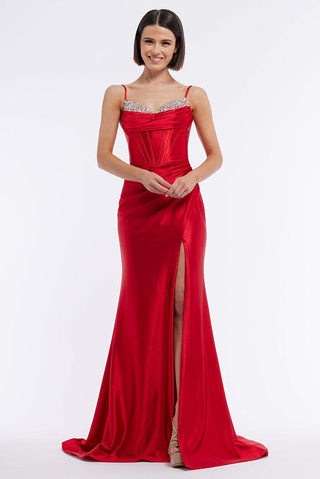 This Vienna Prom 7959 Long Prom Dress features a beautiful satin corset, embellished with intricate beadwork and stunning ruching details. The elegant slit train adds a touch of sophistication to this formal pageant gown. Make a statement at your next event with this timeless and luxurious dress.