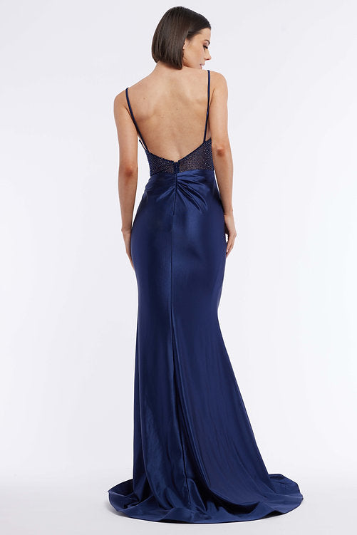 The Vienna Prom 7960 is an elegant evening gown featuring a long satin skirt, ruched bustier corset, and a dazzling crystal bodice – the perfect look for any pageant or formal occasion. The maxi slit design gives a subtle hint of sexiness that won't overpower the sophistication of this classic silhouette.
