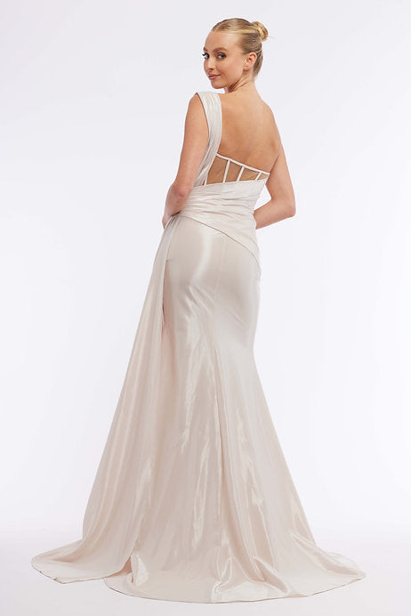 This Vienna Prom 7964 long prom dress features a one shoulder design with a sheer bodice, creating a modern and stylish look. The maxi length and slit cut out add allure and elegance, while the formal pageant gown design makes it perfect for any special occasion.