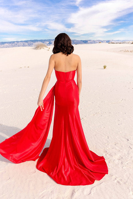 This stunning Vienna Prom 7971 Dress features a fitted corset and plunging sweetheart neckline that will accentuate your curves and make you feel confident on your special night. The cape adds a touch of elegance, making this the perfect formal gown for any pageant or prom.