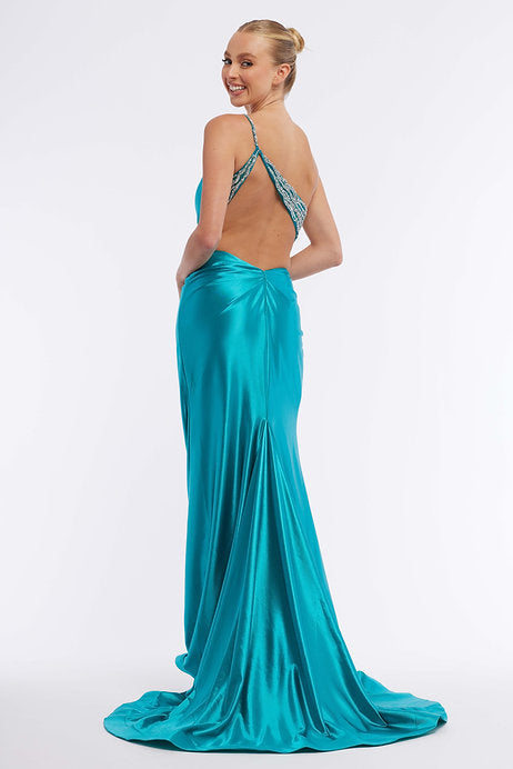 Expertly designed for a glamorous and sophisticated look, the Vienna Prom 7974 Long Prom Dress is a stunning choice. The fitted asymmetrical neckline highlights your curves, while the intricate beading adds elegant detail. With a high slit and formal pageant gown silhouette, this dress exudes confidence and style.