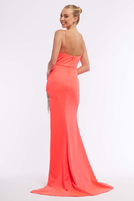 Expertly crafted from high-quality materials, the Vienna Prom 7975 dress boasts a fitted silhouette, open back design, and elegant spaghetti straps. Complete with a daring thigh-high slit, this formal pageant gown is the perfect choice for any special occasion. Make a statement in this stunning dress and turn heads wherever you go.