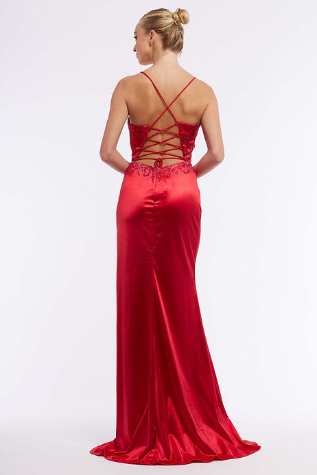 This Vienna Prom 7979 Long Prom Dress features a fitted lace up back and spaghetti straps, creating an elegant and secure fit. The slit adds a touch of sophistication while the formal pageant gown design enhances your natural curves. Be the center of attention in this stunning and comfortable dress.