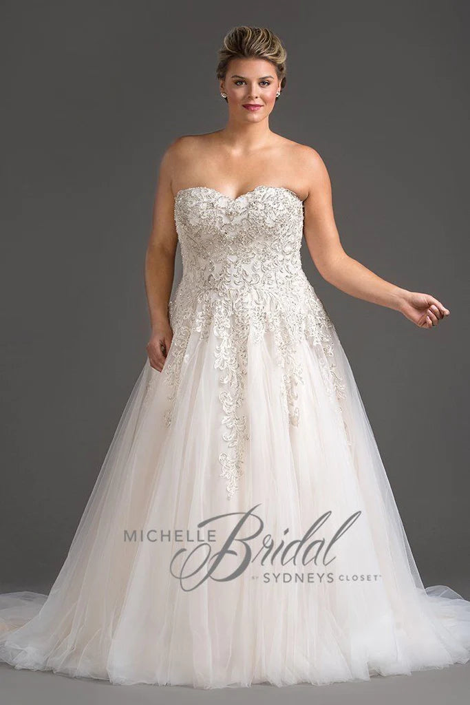 Michelle Bridal For Sydney's Closet MB1819 A-Line Sweetheart Neckline Strapless Lace Up Back Heavily Beaded Bodice Plus Size "Vanessa" Bridal Gown. Impress your guests on your special day with the luxurious Vanessa bridal gown from Michelle Bridal for Sydney's Closet. Crafted with a sweetheart neckline and a heavily beaded bodice, this strapless A-line gown also features a stylish lace-up back. Make a lasting impression in this plus size dress.