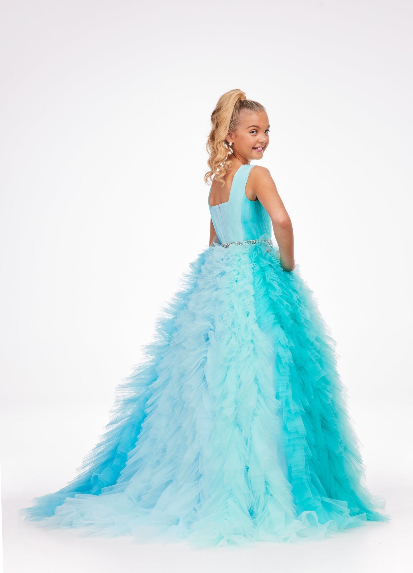 Ashley Lauren Kids 8137 Girls and Preteens Pageant Dress.  This stand out kids gown features a square neckline giving way to a crystal encrusted belt. The ombre tulle skirt completes the look.  Available colors:  Pink Multi, Blue Multi  Available sizes:  4, 6, 8, 10, 12, 14, 16