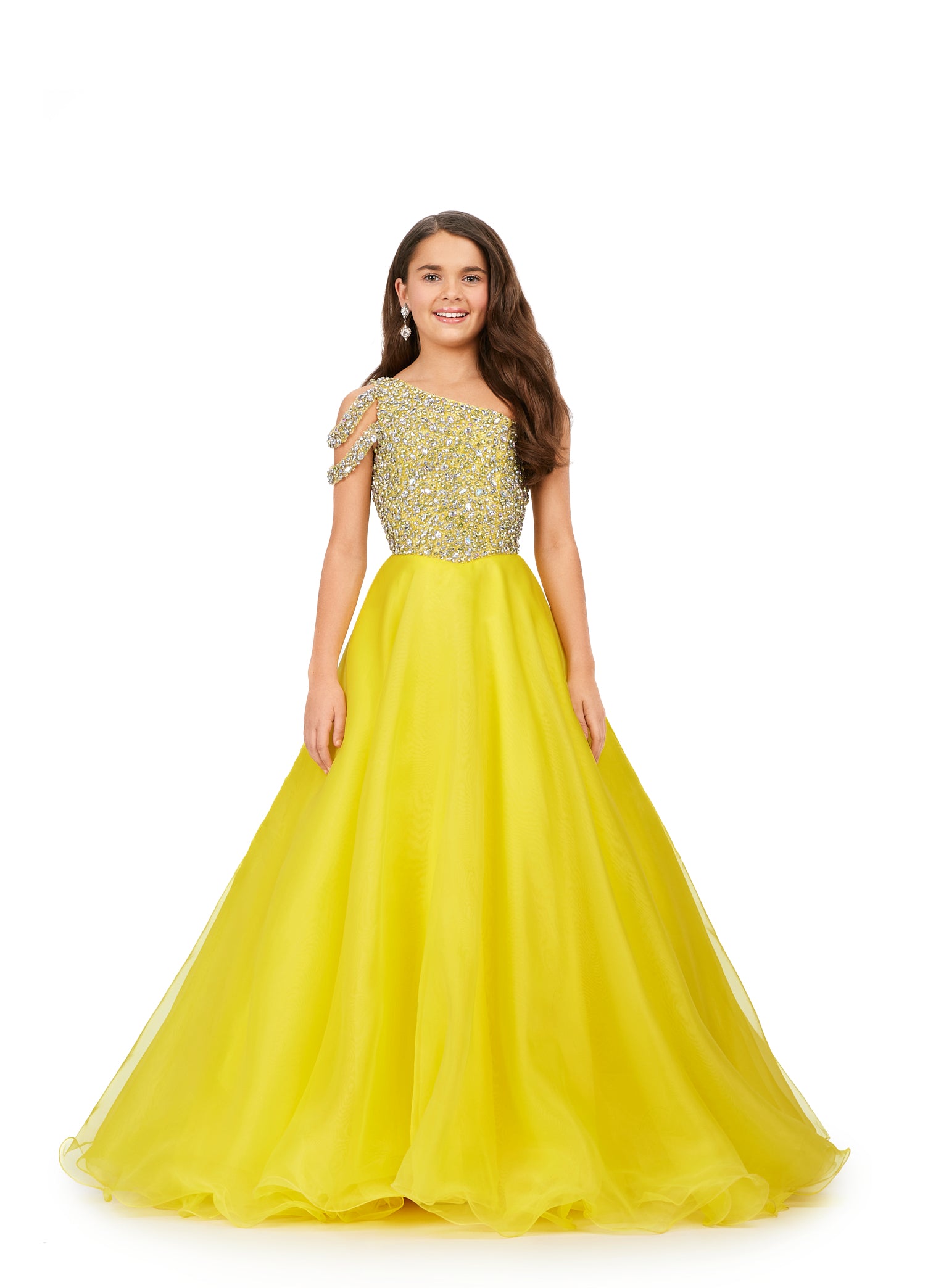 Ensure your little one sparkles on stage in this Ashley Lauren Kids 8182 girls' pageant ballgown. Its one shoulder design features a fully encrusted crystal bodice and shoulder straps, with an a-line organza wire hem skirt for added elegance and movement. Make it a night to remember with this standout dress.  Sizes: 4-16  Colors: Yellow, Aqua, Red