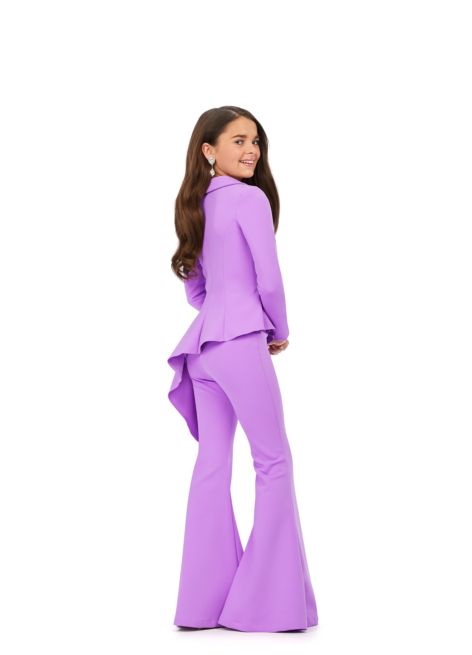 The Ashley Lauren Girls 8207 Long Sleeve Two Piece Scuba Jumpsuit is the perfect choice for any special occasion. This stylish two piece features an asymmetric hem and flare pant legs, perfect for making a statement while maintaining a professional look. With this time-tested jumpsuit, make a lasting impression on the pageant or job interview platform.  Sizes: 4-16  Colors: Orchid, Hot Pink, Green