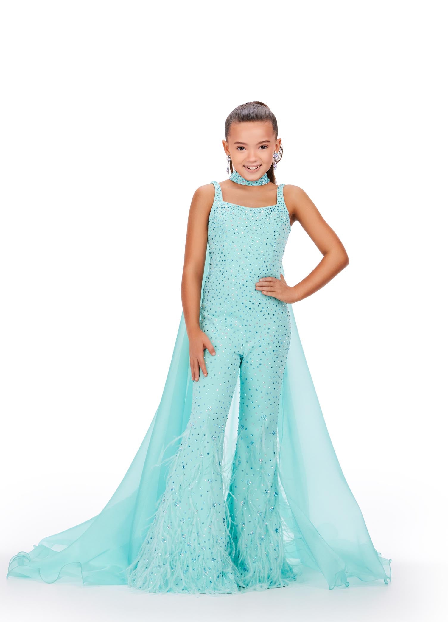 Ashley Lauren Kids 8210 Long Girls Pageant Jumpsuit with Crystal embellishements and a scoop neckline. Feather Embellished flared Bell Bottoms with a choker embellished with crystals and organza Cape.  Sizes: 12  Colors: Aqua