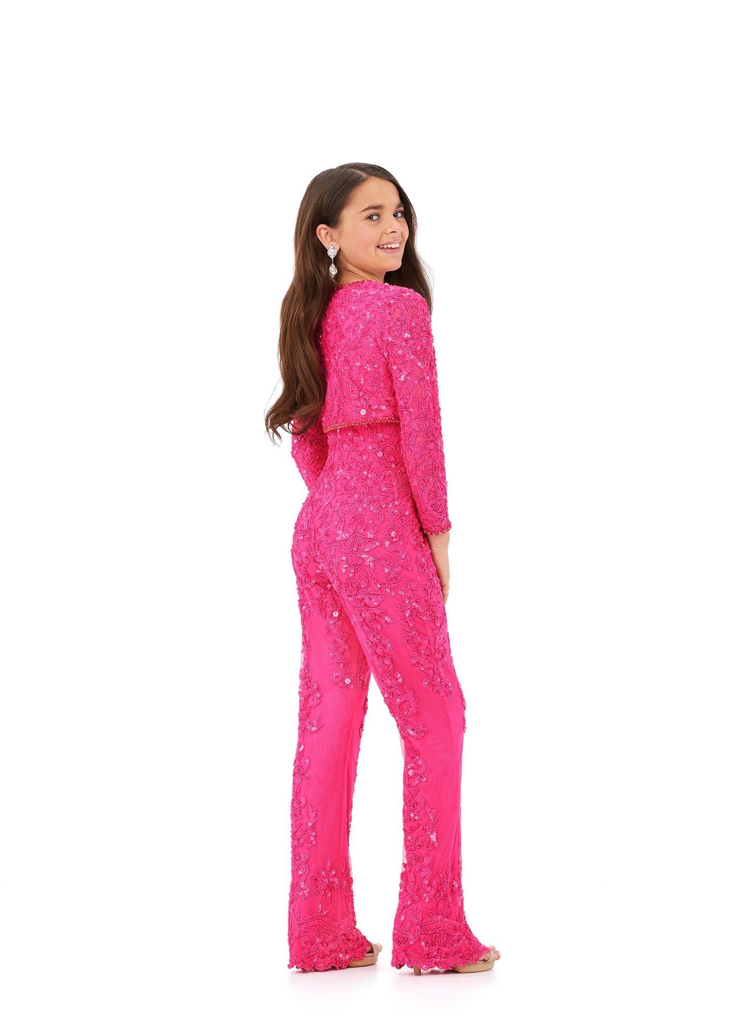 Dazzle the judges in Ashley Lauren Kids 8232 Girls Beaded Pageant Jumpsuit. This two-piece set includes a fully beaded jumpsuit and an accompanying long-sleeve blazer jacket, complete with sequin accents. With this ensemble, your little one will look and feel like a star.  Sizes: 4-16  Colors: Coral, Hot Pink, Jade